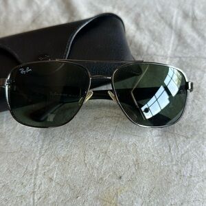 Ray ban sunglasses by Luxottica with black sides 100% UV protection